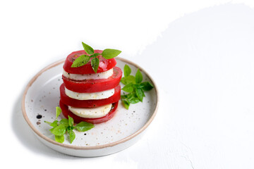 Caprese, tomatoes with mozzarella and Basil