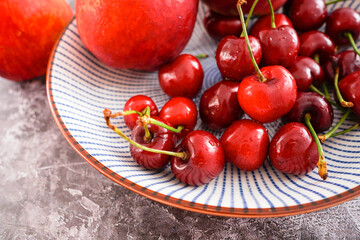 All kinds of fresh fruits are on the plate