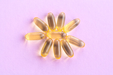 Fish oil capsules with omega 3 and vitamin D, healthy concept