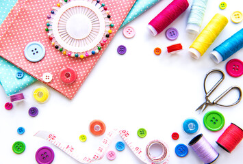 Sewing accessories on a white background