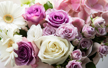 Beautiful flowers in a white round box