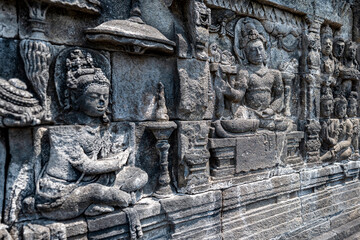 The stories from Mahayana Buddhist Sutras carved on the relief panels of Borobudur Temple (750AD)