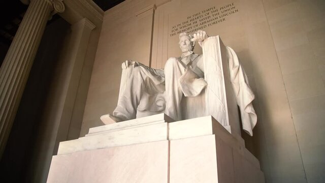 Imposing Low-Angle of Abraham Lincoln Statue in Washington, DC, USA.