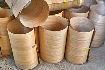 Oak veneer roll. Wood texture. Furniture manufacture. Close-up