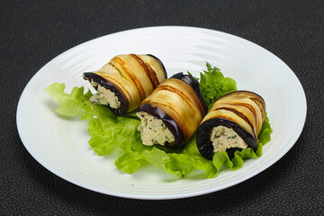 Stuffed eggplant roll with cheese and herbs