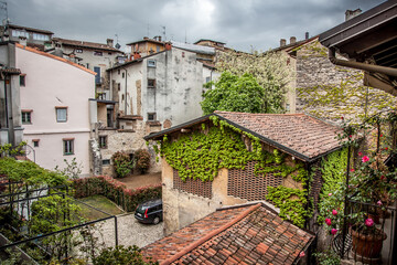 Fototapeta na wymiar View from the window to the courtyard in the Upper city. Bergamo, Lombardy, Italy