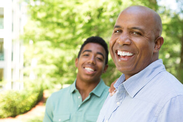 African American father and teen son.