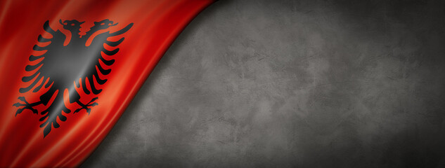 Albanian flag on concrete wall banner