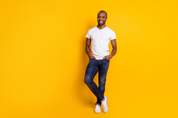 Fototapeta na wymiar Full length photo of attractive nice afro american guy stand enjoy spring free time holiday weekend wear hipster style outfit shoes isolated over bright color background