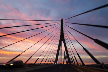 Bridge border between Portugal and Spain at sunset