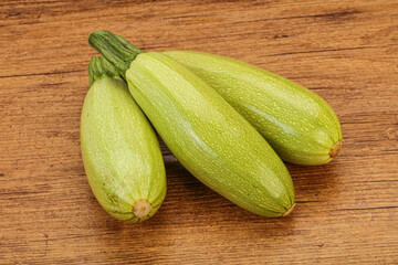 Young tasty zucchini over board