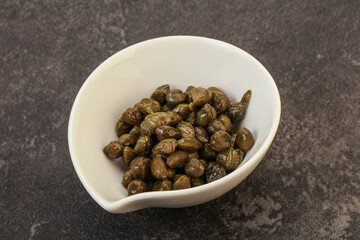Tasty capers in the bowl