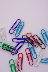 colorful paper clips isolated on white background