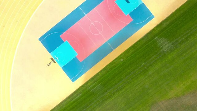 Basketball court on stadium from above. Aerial view to playground.