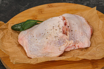 Raw chicken hip with spices