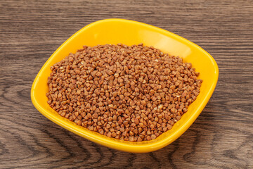 Raw buсkwheat cereal in the bowl