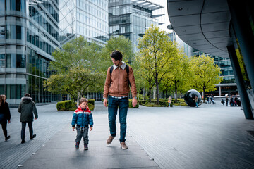 Father and son walking and chatting
