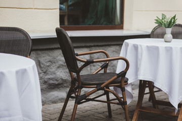 empty tables of outdoor cafe
