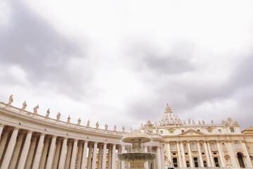 Obraz premium Vatican, Rome / Italy 07.25.2019 .. A fountain before St. Peter's Cathedral