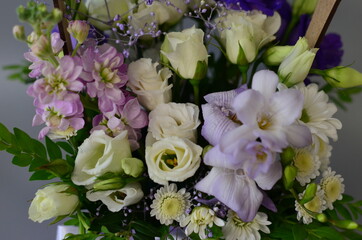 
wooden boxes with fresh flowers