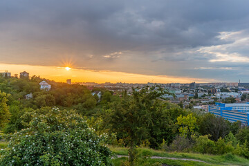 Fototapeta na wymiar Kyiv (Kiev), Ukraine - June 04, 2020: A view from the famous viewing place and park reserve - Tatarka hill