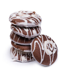Group of chocolate cookies drizzled with white icing