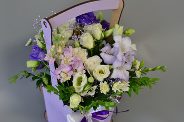 
wooden boxes with fresh flowers