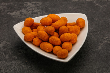 Spicy peanut heap in the bowl