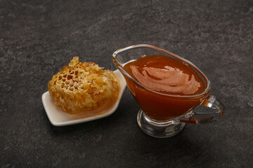 Natural honey in the bowl