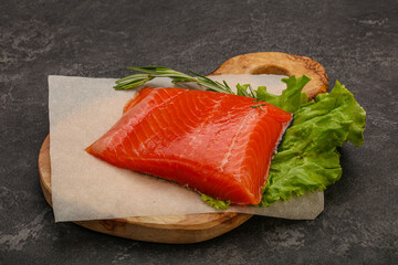 Salmon piece steak served rosemary