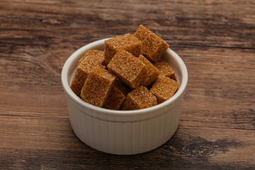 Cane sugar cubs in the bowl