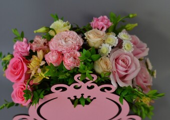 
wooden boxes with fresh flowers