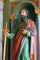 Obraz premium St. Paul statue on the main altar at St. John the Baptist Church in Sveti Ivan Zabno, Croatia