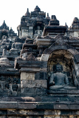 Fototapeta premium Statues and Stupas of the Borobudur Temple, West Java, Indonesia (750AD)
