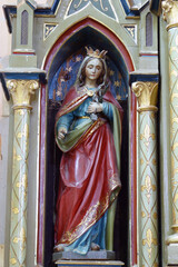 St. Catherine of Alexandria statue on the altar of St. Anthony of Padua at St. Roch Church in Luka,...
