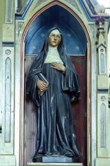 St. Margaret Mary Alacoque statue at the altar of the Sacred Heart of Jesus at St. Roch Church in...