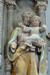 St. Joseph with baby Jesus statue on the main altar at St. Catherine of Alexandria Church in Dapci, Croatia