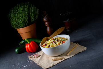 bulgur kaszotto with fresh vegetables and kidney bean