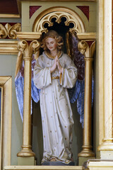 Angel statue on the main altar in the church of St Stephen the Protomartyr in Stefanje, Croatia