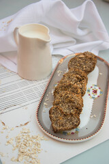 Chewy homemade oatmeal cookies with milk.