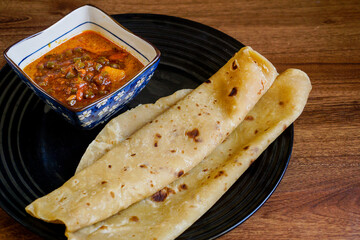 Chapati with chicken curry mix with sardine sambal.