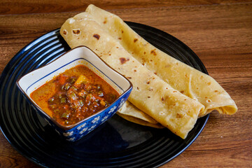 Chapati with chicken curry mix with sardine sambal.