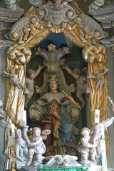 Fototapeta na wymiar Main altar at St. Catherine of Alexandria Church in Samarica, Croatia