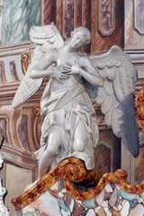 Obraz premium Angel statue on the altar at St. Catherine of Alexandria Church in Zagreb, Croatia