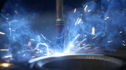 Modern Industrial Robot welding machine active in factory. Automation welding mechanical procedure....