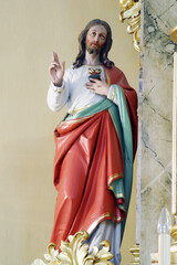 Fototapeta premium Sacred Heart of Jesus, statue on the altar Our Lady of Sorrows in the parish church of Saints Peter and Paul in Kasina, Croatia