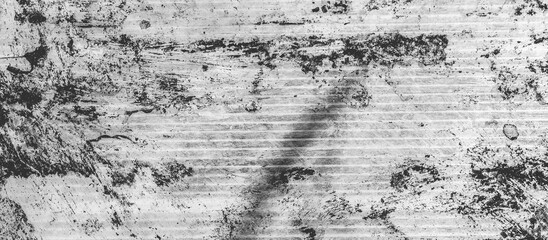 Abstract monochrome background with scratches, lines and paint spots.