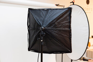 Studio lights, reflector, white background and negative space for product photography customers and e-commerce business based on images on internet.