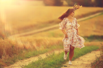 happy girl freedom in summer field, glare of the sun abstract background france provence autumn