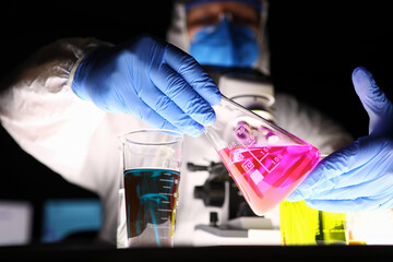 Man mixing two colours together
